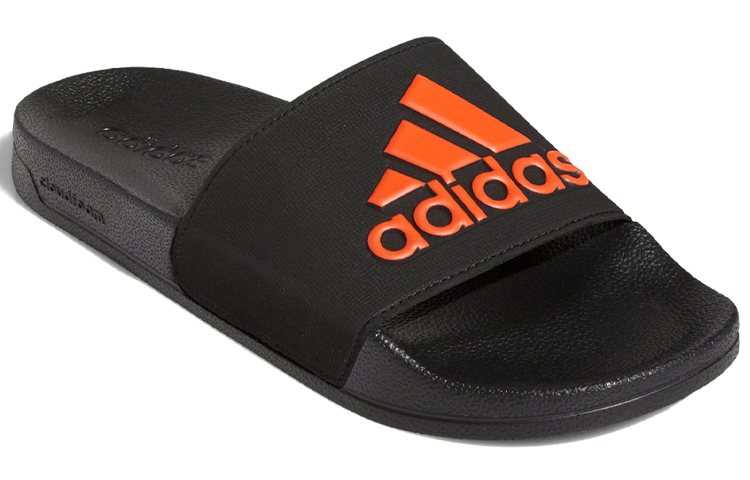 Shop adidas Adilette 簡潔拖鞋 黑橙