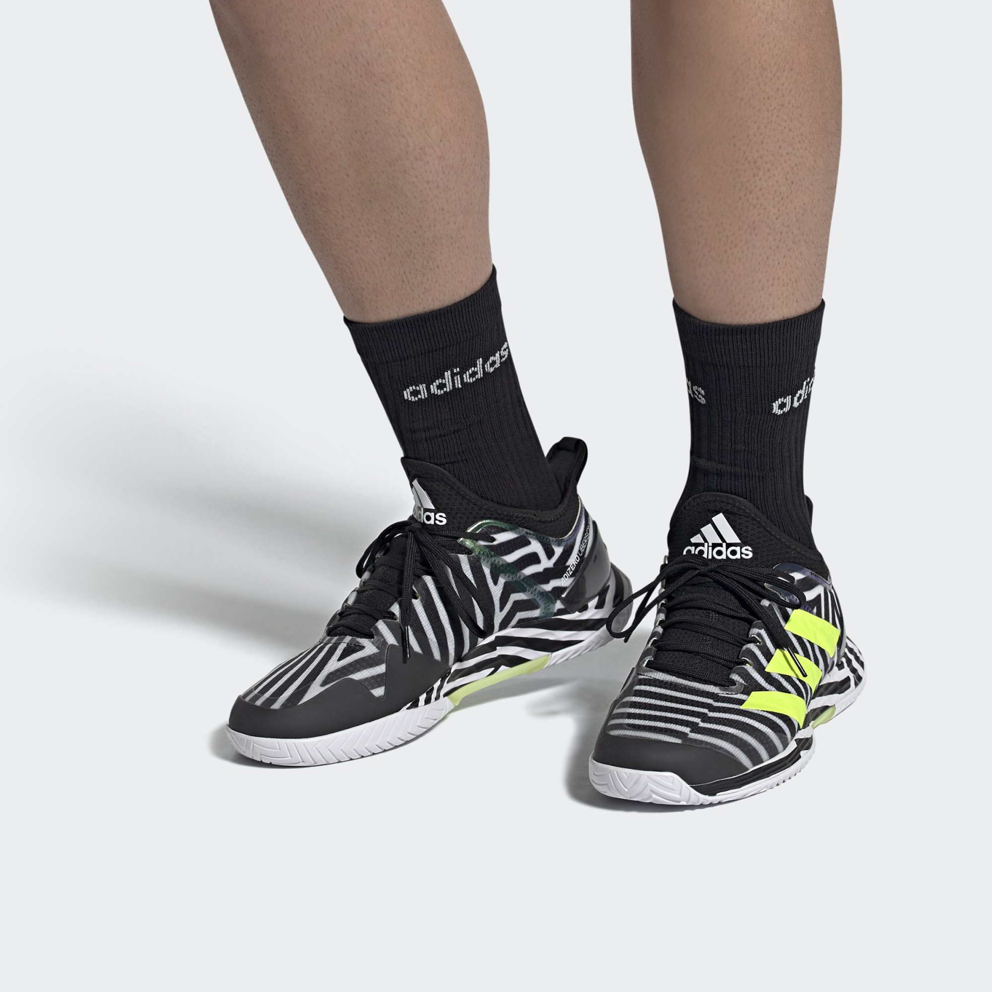 Sizing adidas Adizero Ubersonic 4 ''Schwarz Solar Gelb'' G55454