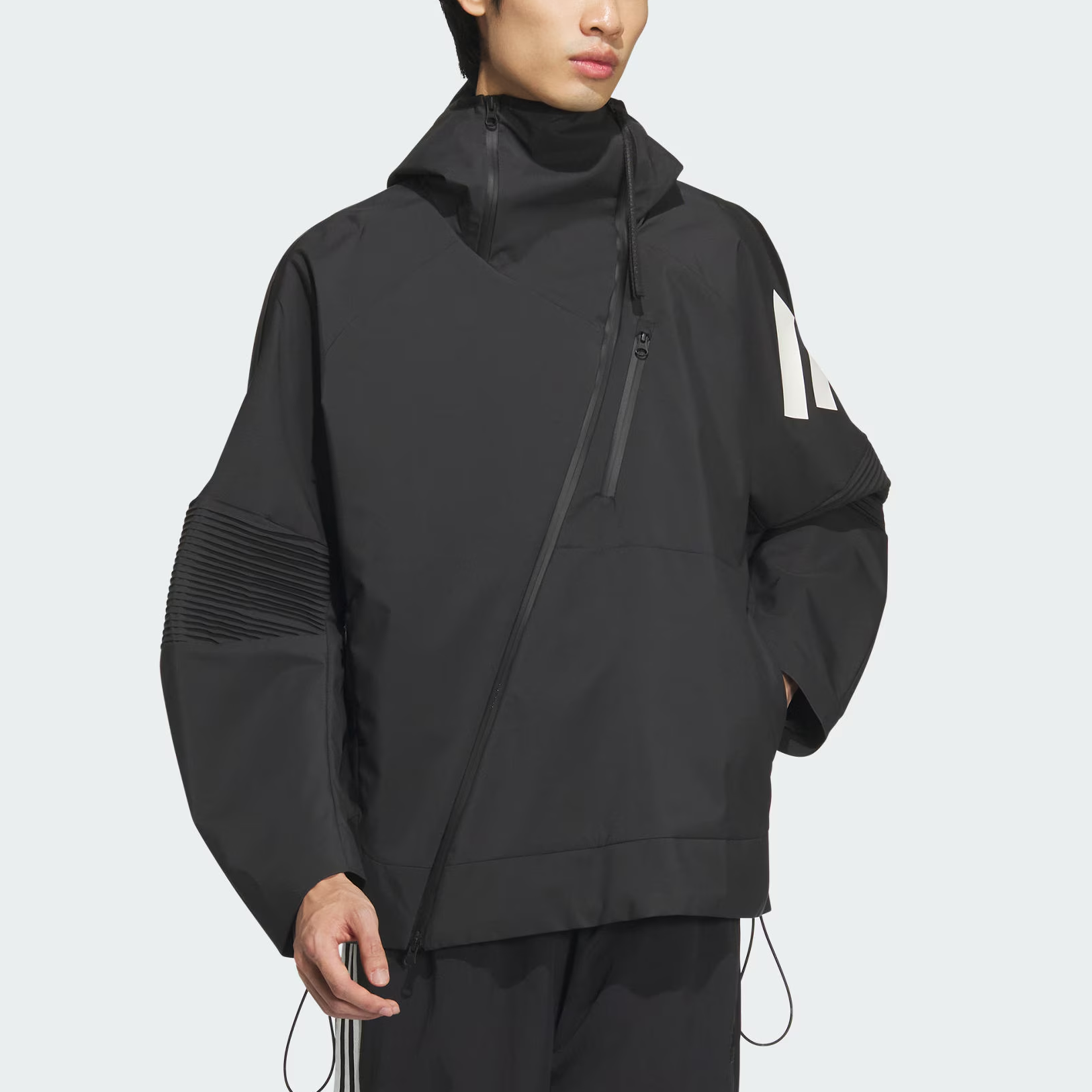 Lookbook adidas Future Style FW24 Hoodie Hitam dengan Banyak Kantong. JN3424