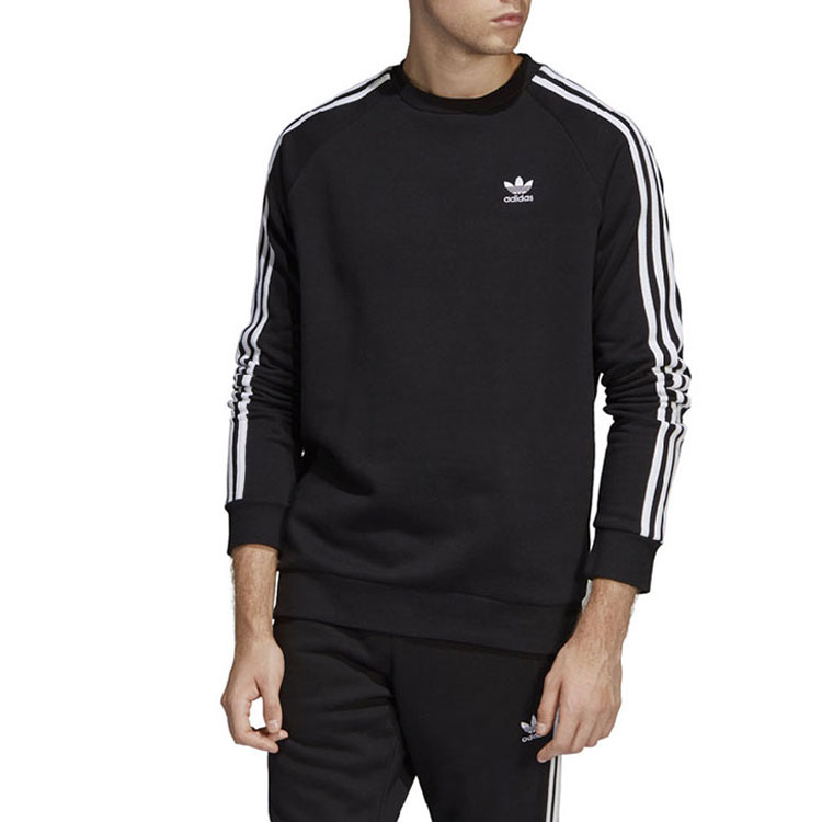 Shop adidas Originals 三條紋黑色保暖抓毛套頭衫 DV1555