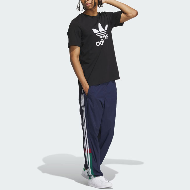 Purchase adidas Originals Track Pants Jalur Tricolor dengan Pinggang Elastik. IN0998