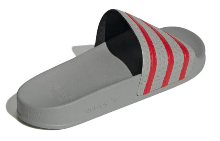 Shop adidas originals Adilette slides 休閒耐磨拖鞋 灰紅 男女共款