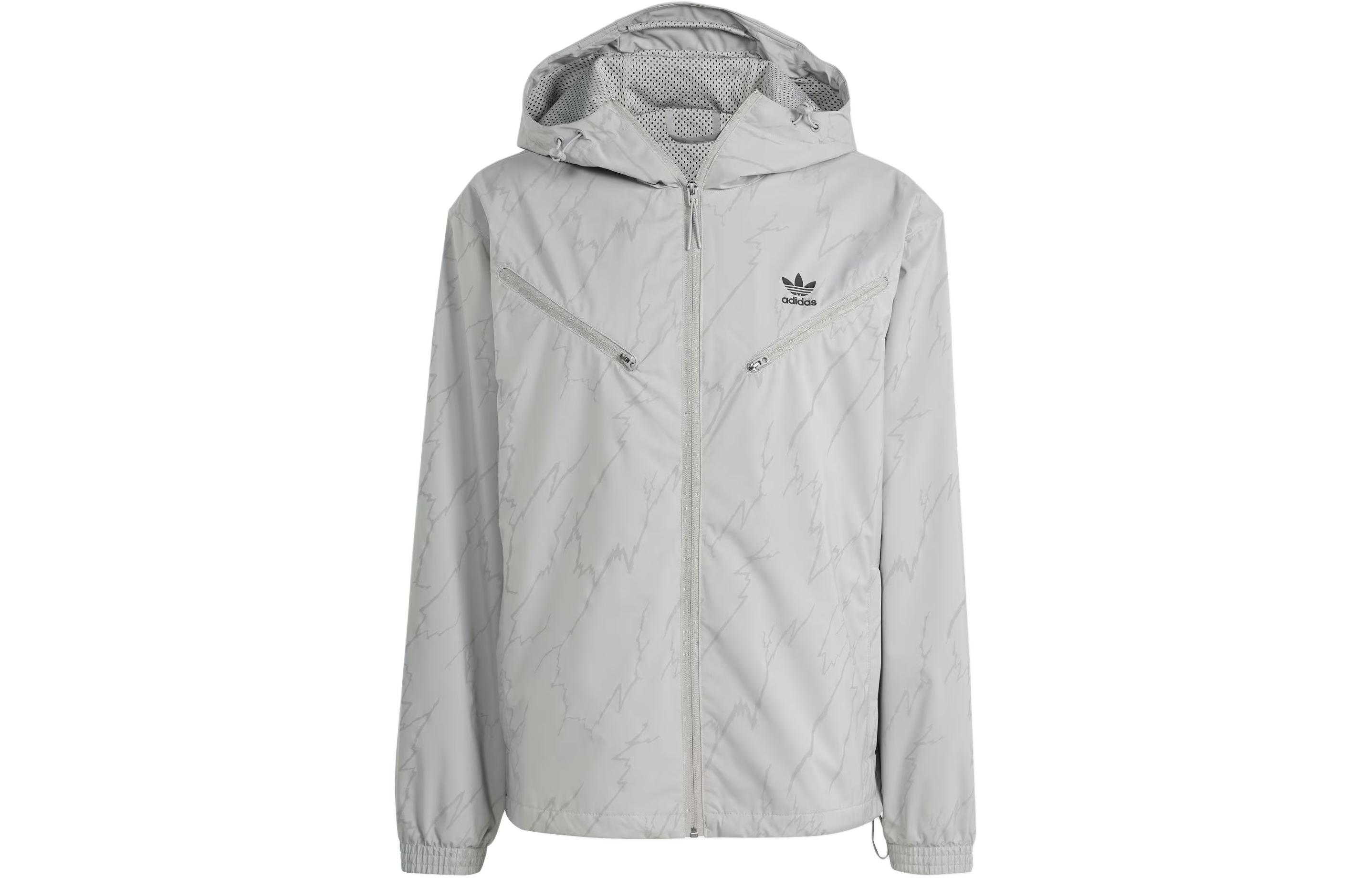 Order Chaqueta Rompevientos adidas Originals Montreal Gris Sólido con Estampado. IS2811