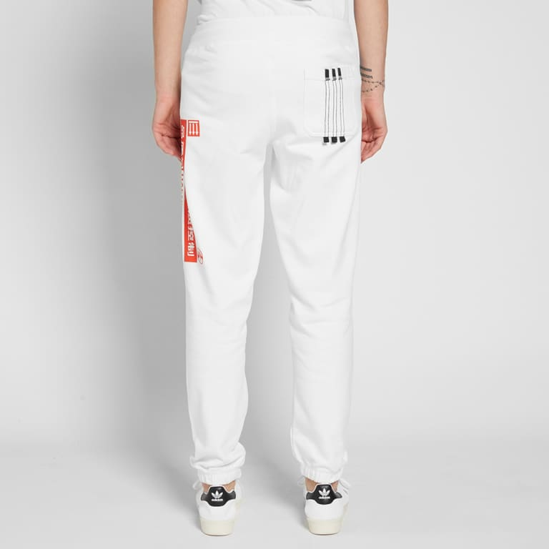Shop Pantalones Jogger adidas Originals SS23 Blancos con Estampado de Letras Casual. DM9857