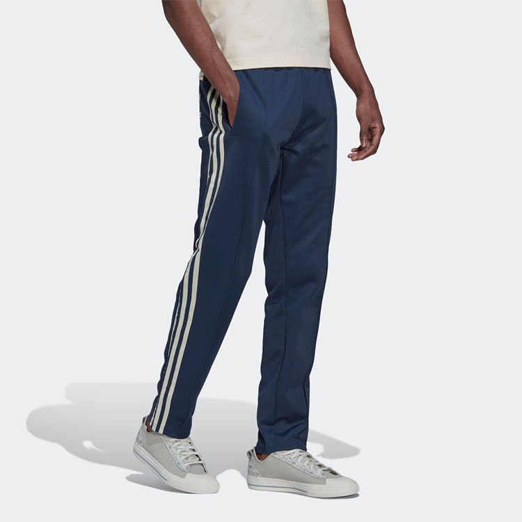 Purchase Pantalones Jogger Retro de Punto adidas Originals Trefoil Logo Rayado Azul Hombre. HN1674