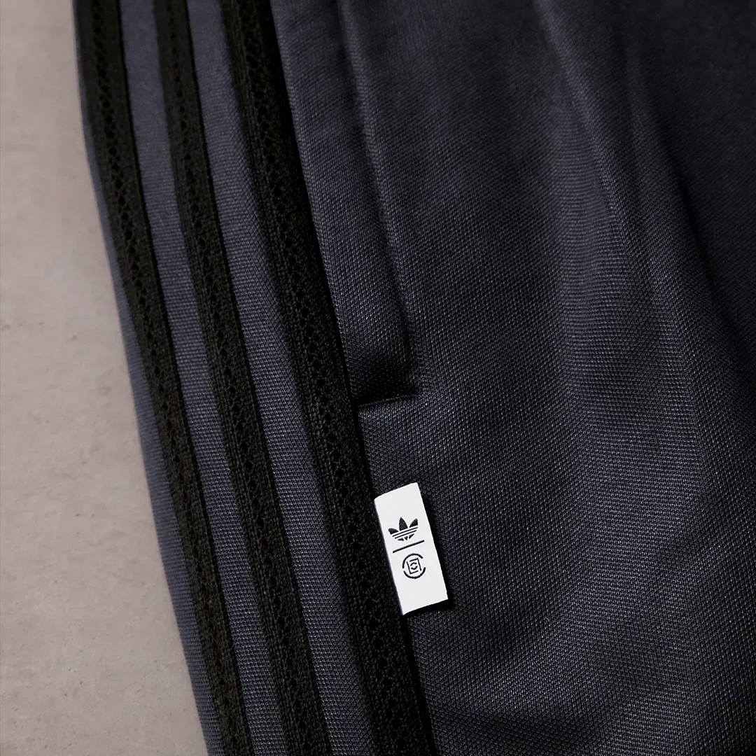 Purchase 阿迪达斯 Originals x CLOT FW24 黑色条纹时尚西装裤. IX6560
