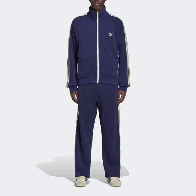 Shop 아디다스 오리지널스 x 웨일스 보너 레트로 사이드 스트라이프 트랙 팬츠 블루. HC0579
