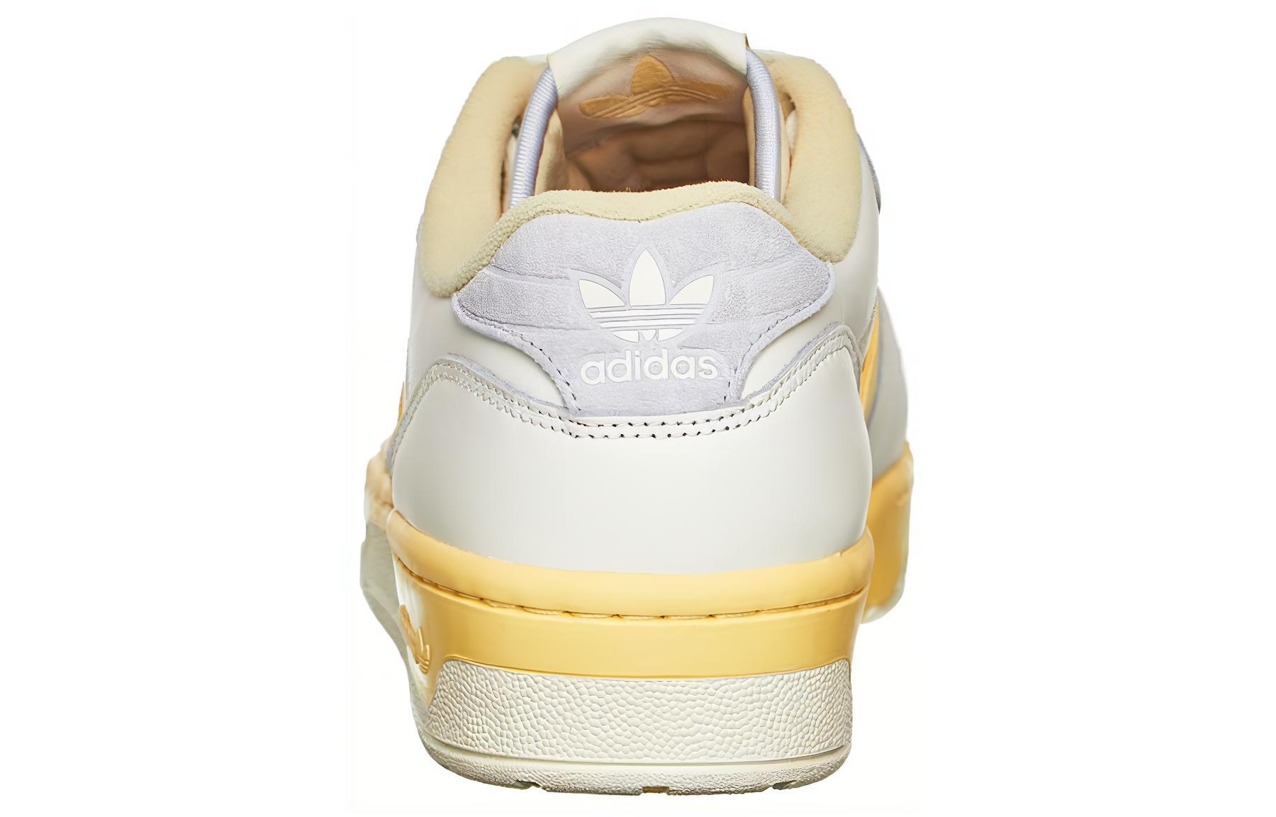 Shop 아디다스 라이벌 로우 '화이트 이지 옐로우' EE5920