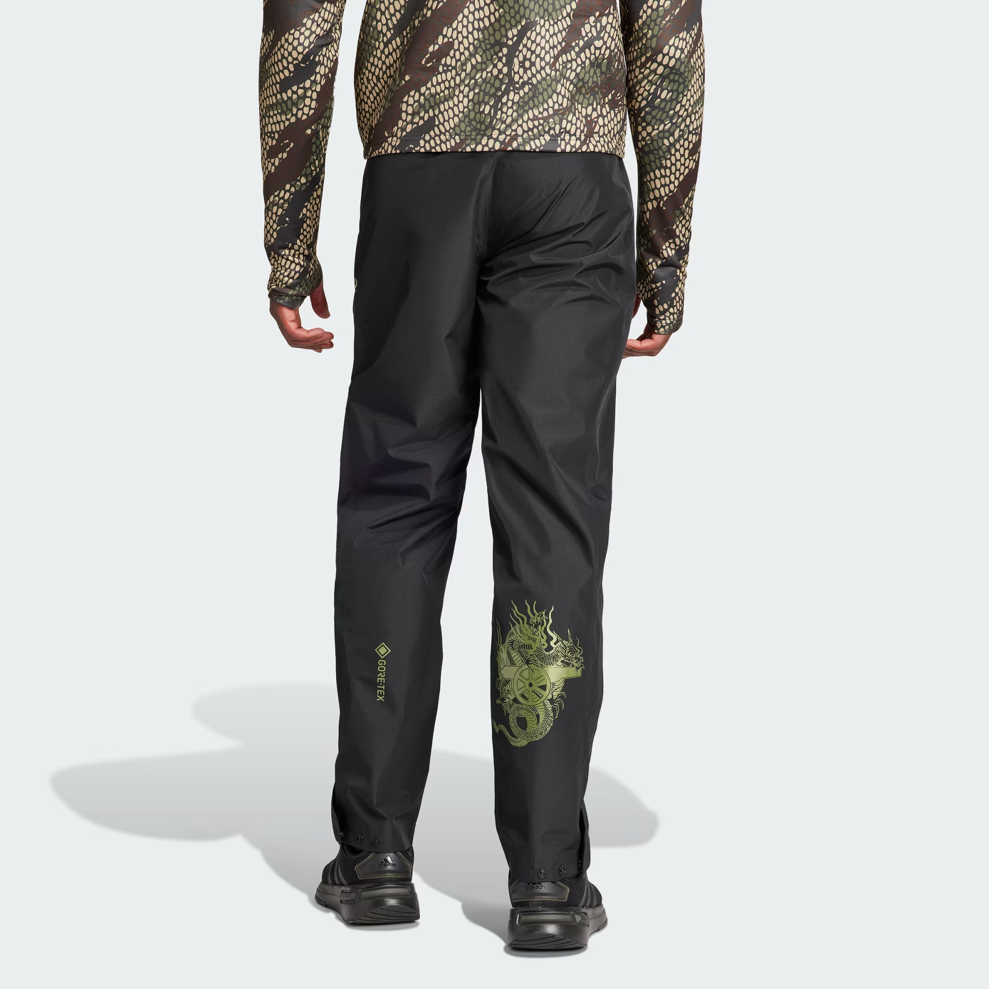 Shop adidas x Maharishi Arsenal Gore-Tex Paclite  Black Football Pants. IN4756