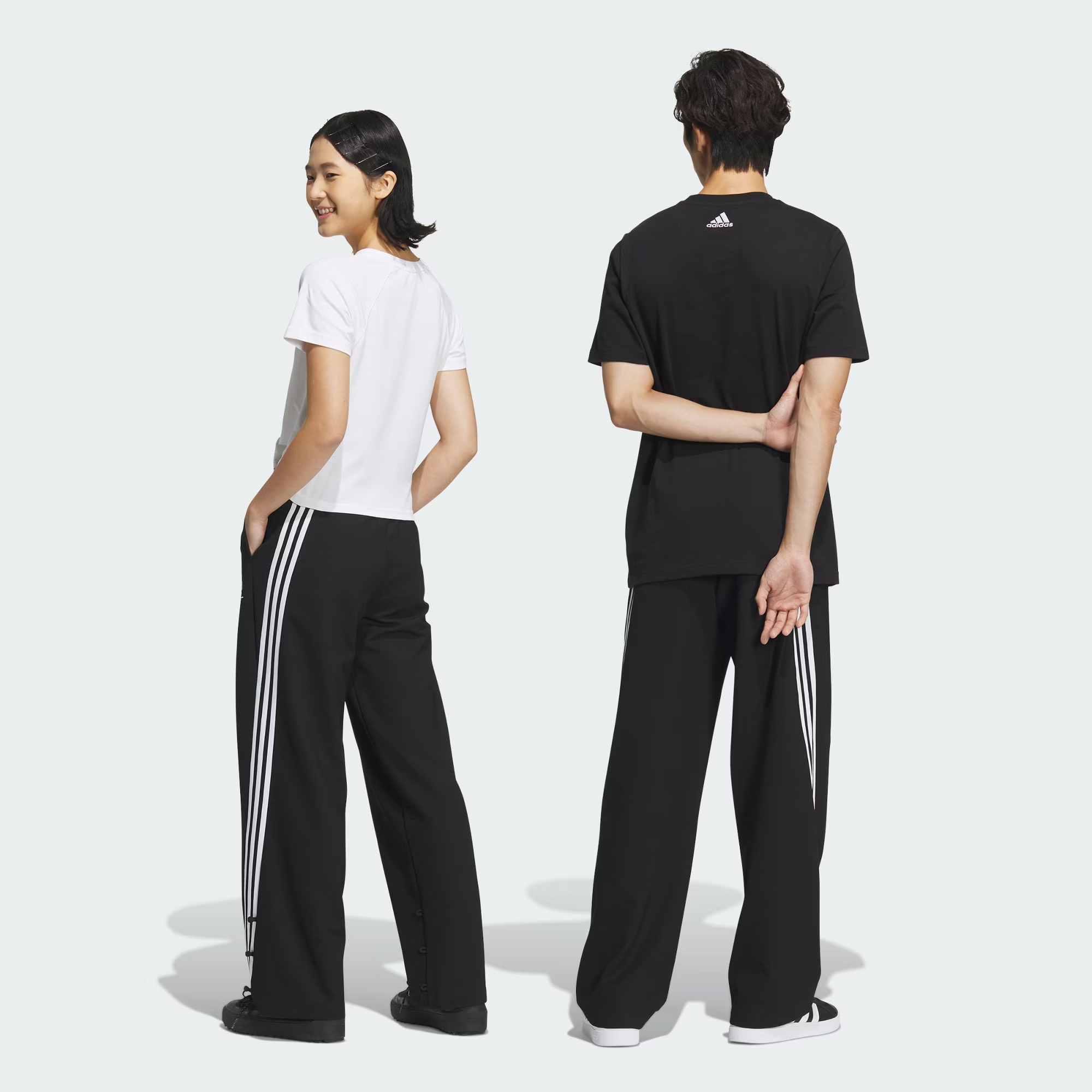 Shop adidas x Yang Guidong FW23 Black Striped Loose Fit Knit Track Pants Unisex. JE1119