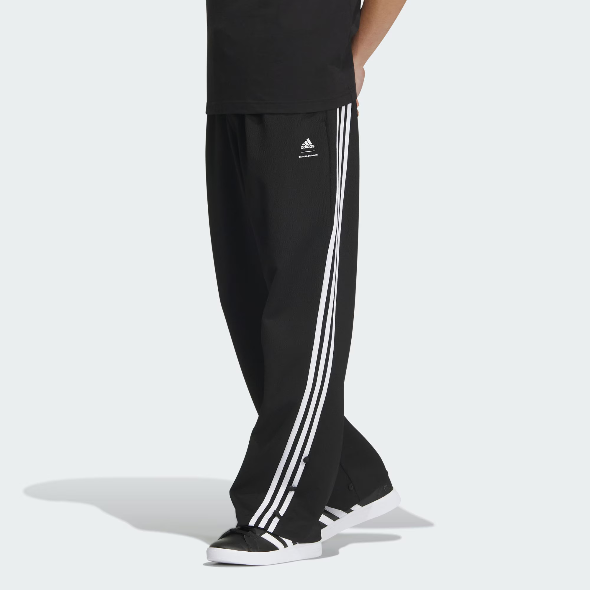 Details for adidas x Yang Guidong FW23 Black Striped Loose Fit Knit Track Pants Unisex. JE1119