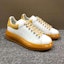 Order Sneakers Kasual Alexander McQueen Calfskin Kuning Tail 211259M237028