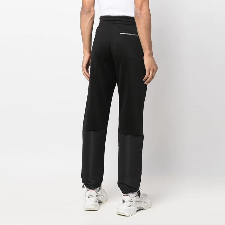 Shop Alexander McQueen FW22 Seluar Jogger Hitam Knit Tirus Gaya Sukan Lelaki. 701304QTX531000