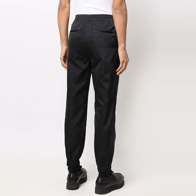 Purchase Alexander McQueen SS22  Black Solid Knit Jogger Sweatpants. 678056-QSR64-1000