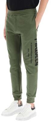 Alexander McQueen SS22 Celana Jogger Hijau dengan Cetakan Huruf 688714-QSZ81-0904 Purchase Alexander McQueen SS22 Celana Jogger Hijau dengan Cetakan Huruf 688714-QSZ81-0904