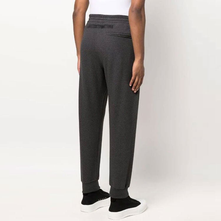Shop Alexander McQueen SS22 灰色寬鬆版型運動長褲 642664-QSX75-0902