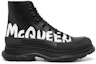 Order Alexander McQueen Tread Slick But 'Logo Grafiti - Hitam' 682422WIABD1070