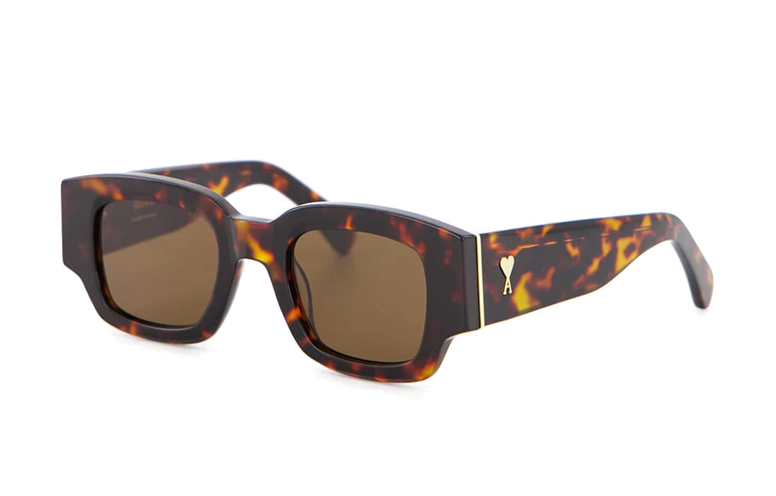 Shop Gafas de sol tortuga hombre Ami Paris diseño irregular con logo. UGL507AM0004955