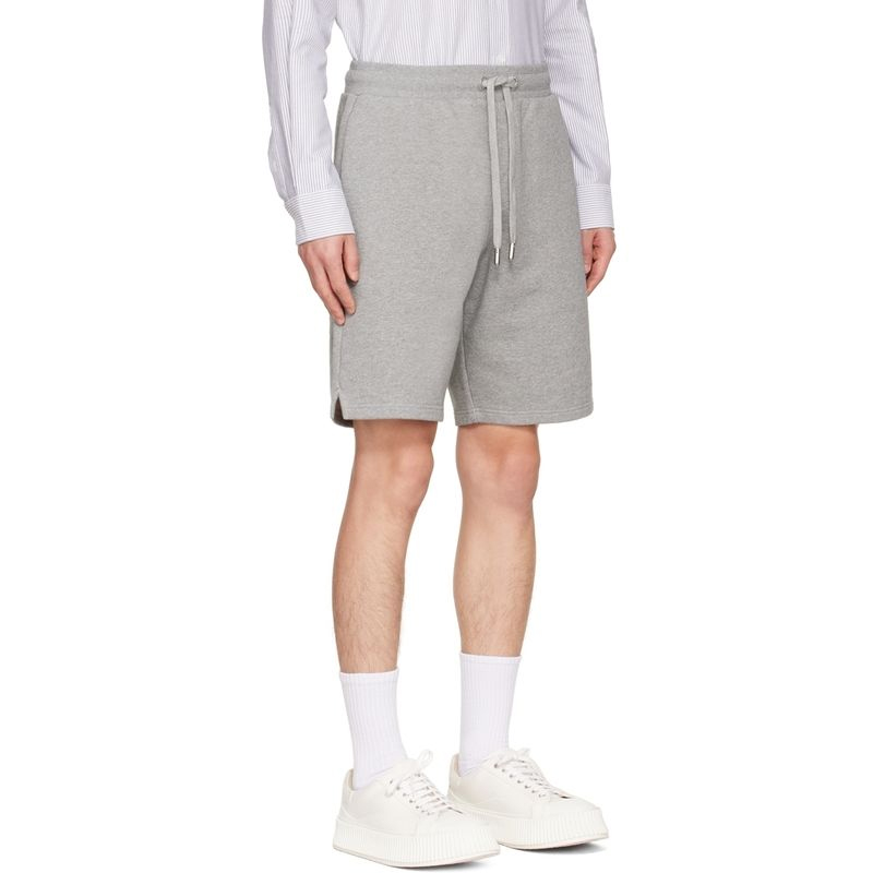 Sizing Ami Paris AMIPARIS SS23 灰色寬鬆短褲配心型刺繡。 HSO602747-055