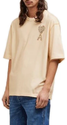 AMI Paris FW23 Loose Fit Heart Logo Crewneck T-Shirt in Off-White. UTS021PA0015268 Purchase AMI Paris FW23 Loose Fit Heart Logo Crewneck T-Shirt in Off-White. UTS021PA0015268