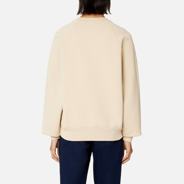 Shop AMI Paris SS23 男女同款香草色刺繡愛心棉質圓領長袖上衣。 USW004747-714