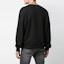 Shop AMIRI スカルプリント クルーネック スウェットシャツ ブラック S0M02158TE-BLK