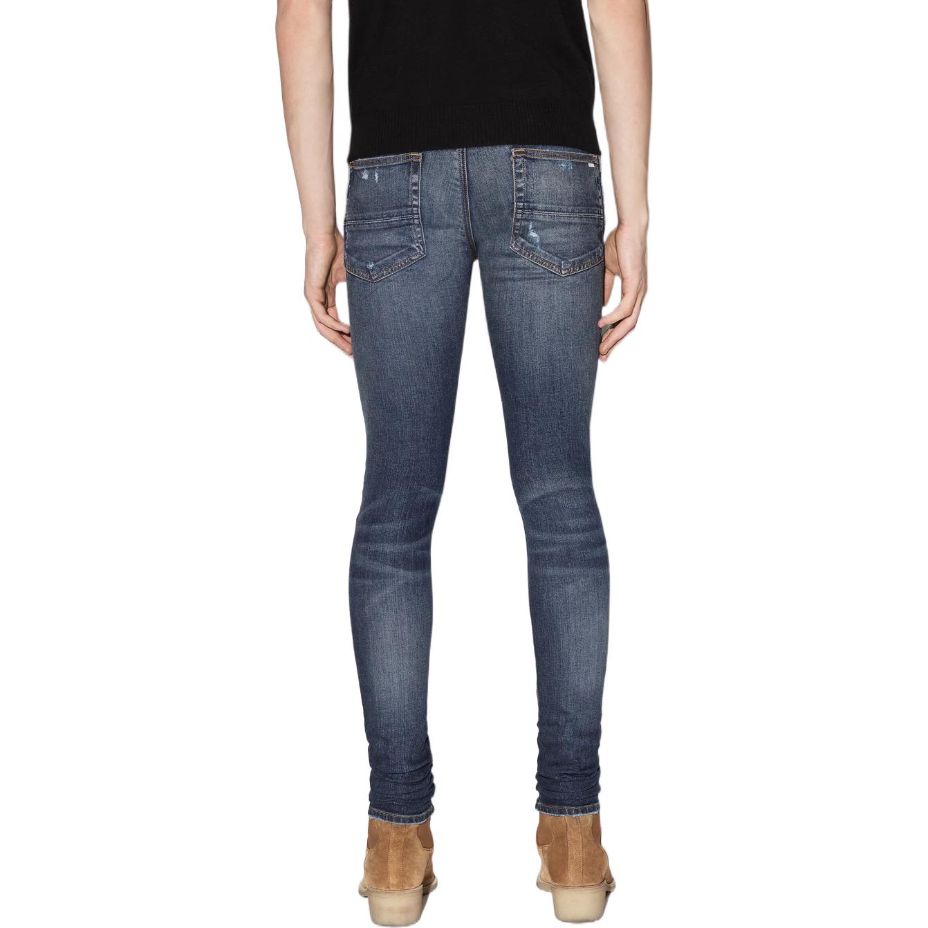 Shop AMIRI 無地スリムフィットミッドライズリブドジーンズ PS22MDS150-403