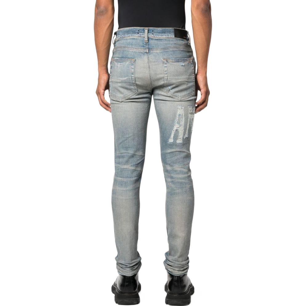Shop AMIRI FW22 刺繡標誌修身藍色牛仔褲 PS23MDS007-408