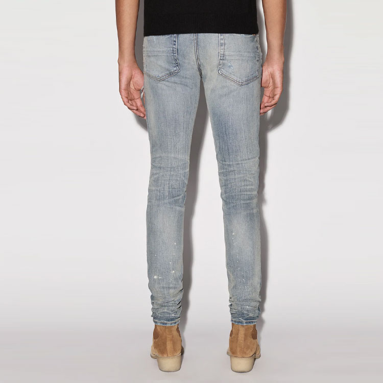 Shop AMIRI MX1 SS22 藍色磨損修身牛仔褲 秋季系列 PXMD001-408