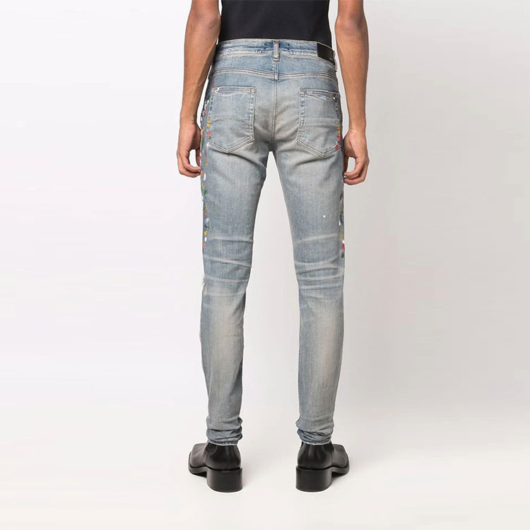 Shop AMIRI SS22 Skinny Jeans Lelaki Biru Spray Paint Distressed PS22MDS202408