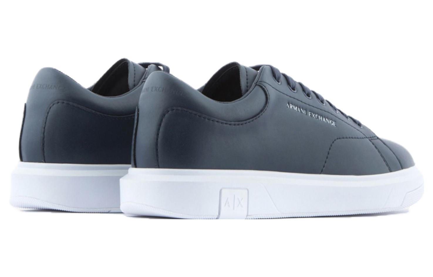 Shop Armani Exchange 海军蓝低帮皮革运动鞋 XUX123XV534100285