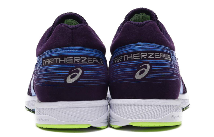 Shop Asics Tartherzeal 6 低筒跑步鞋 黑藍