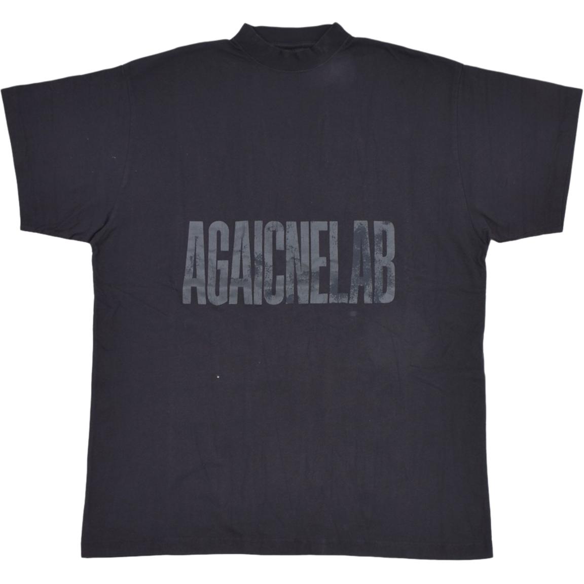 Balenciaga  Oversized Logo Print Crewneck T-Shirt in Dark Gray. 787349TRVA11576