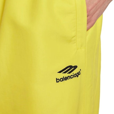 Balenciaga FW22 Yellow Logo Print Knit Straight-Leg Sweatpants Mens Regular Fit. 720215TKO487640 Details for Balenciaga FW22 Yellow Logo Print Knit Straight-Leg Sweatpants Mens Regular Fit. 720215TKO487640