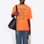 Purchase Camiseta Naranja Balenciaga con Texto Multilingüe Impreso. 641614TJVI37513