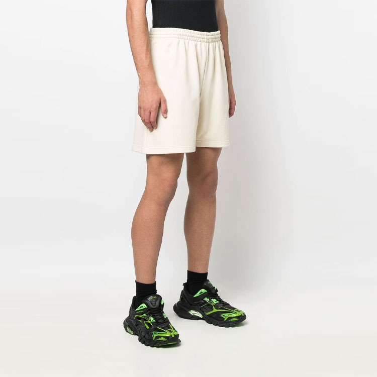 Details for Balenciaga Celana Pendek Pria Regular Fit Beige Logo Kampanye Politikal. 676137TKVI98962