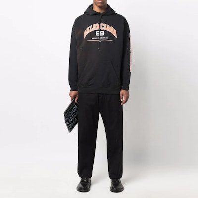 Balenciaga SS22 Logo Print Distressed Washed Hoodie Unisex Black. 570811TLVJ31000 Shop Balenciaga SS22 Logo Print Distressed Washed Hoodie Unisex Black. 570811TLVJ31000
