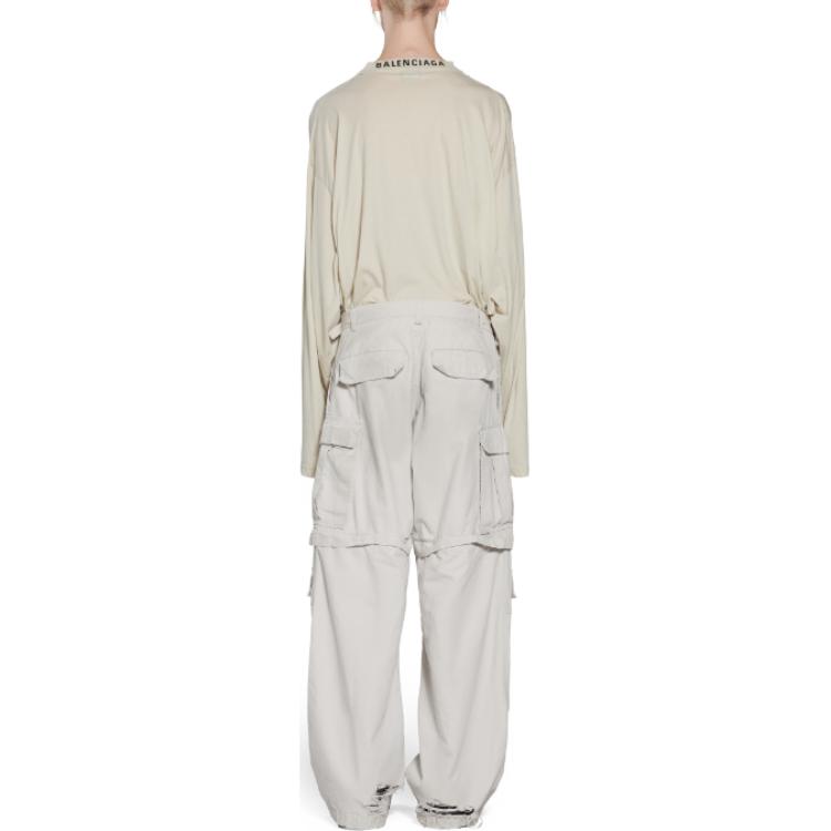 Shop Balenciaga SS23 Celana Putih Pria Distressed Hidden Zipper Relaxed Fit. 746493TKP271400