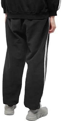 バレンシアガ ストライプ ロゴ ニット ジョガーパンツ ブラック レギュラーフィット カジュアルスタイル 723912TNVP11070 Purchase バレンシアガ ストライプ ロゴ ニット ジョガーパンツ ブラック レギュラーフィット カジュアルスタイル 723912TNVP11070