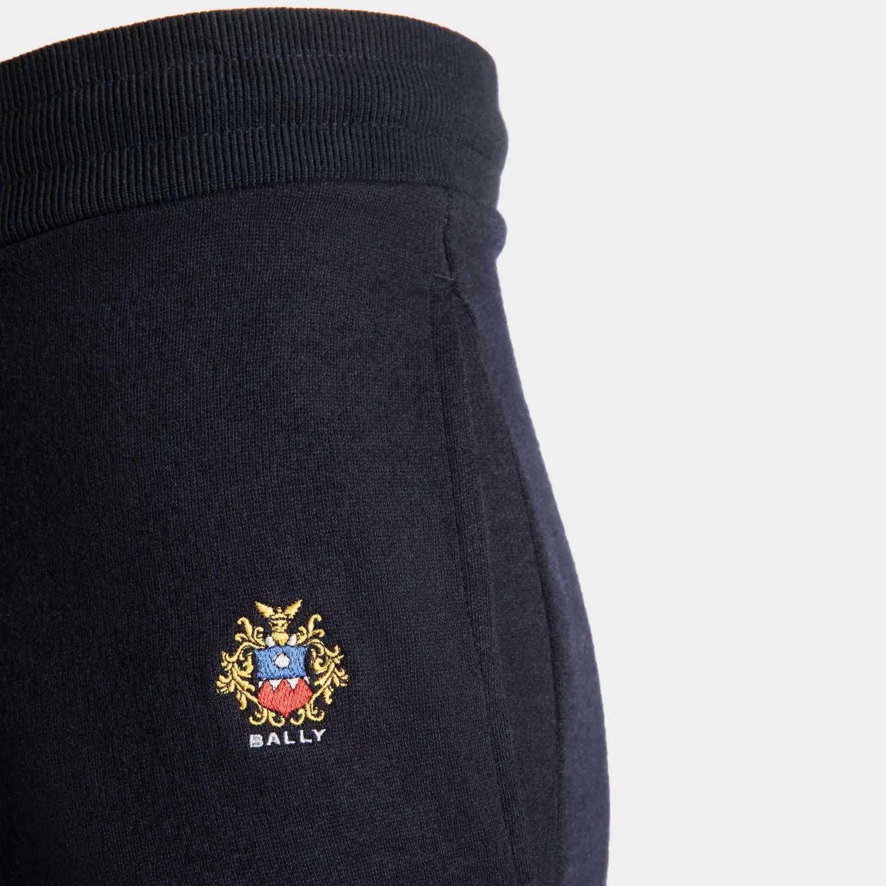 Shop BALLY Seluar Knit Santai Logo Bordir Siri Travel FW24 Navy Blue Adrien Brody 6309557