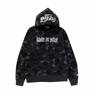 Bape A BATHING APE Coca-Cola FW23 Camo Pullover Hoodie with Embroidered Ape Logo. 1J73-114-904