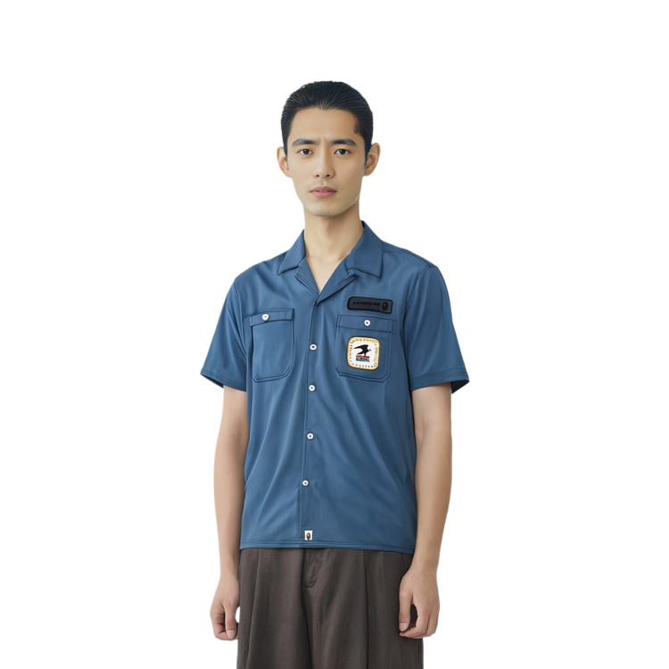 Shop BAPE联名USPS绿色短袖衬衫 邮政鹰标款式合作款。 0ZXSRMX32901I