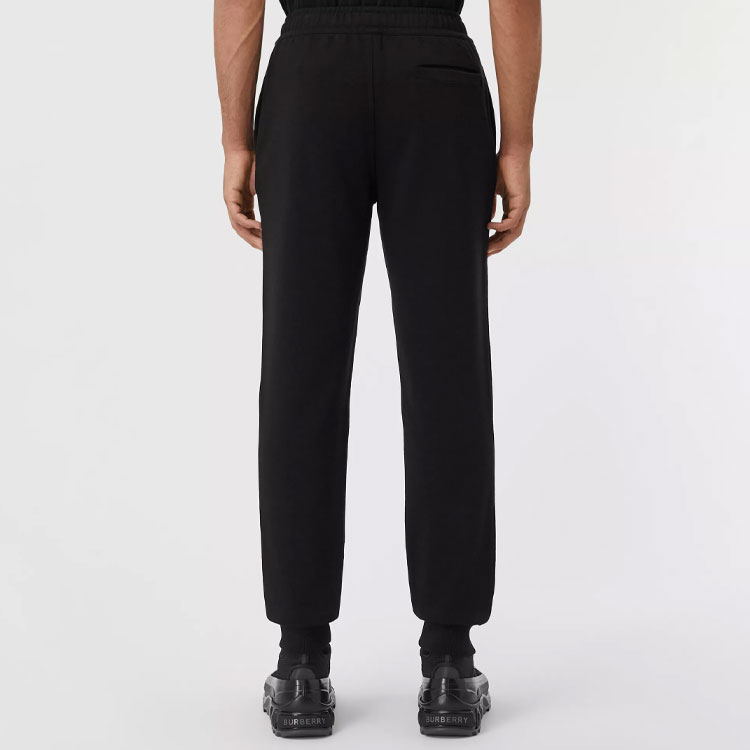 Purchase Pantalones Jogger de Algodón Burberry Negro con Estampado de Insignia. 80427281