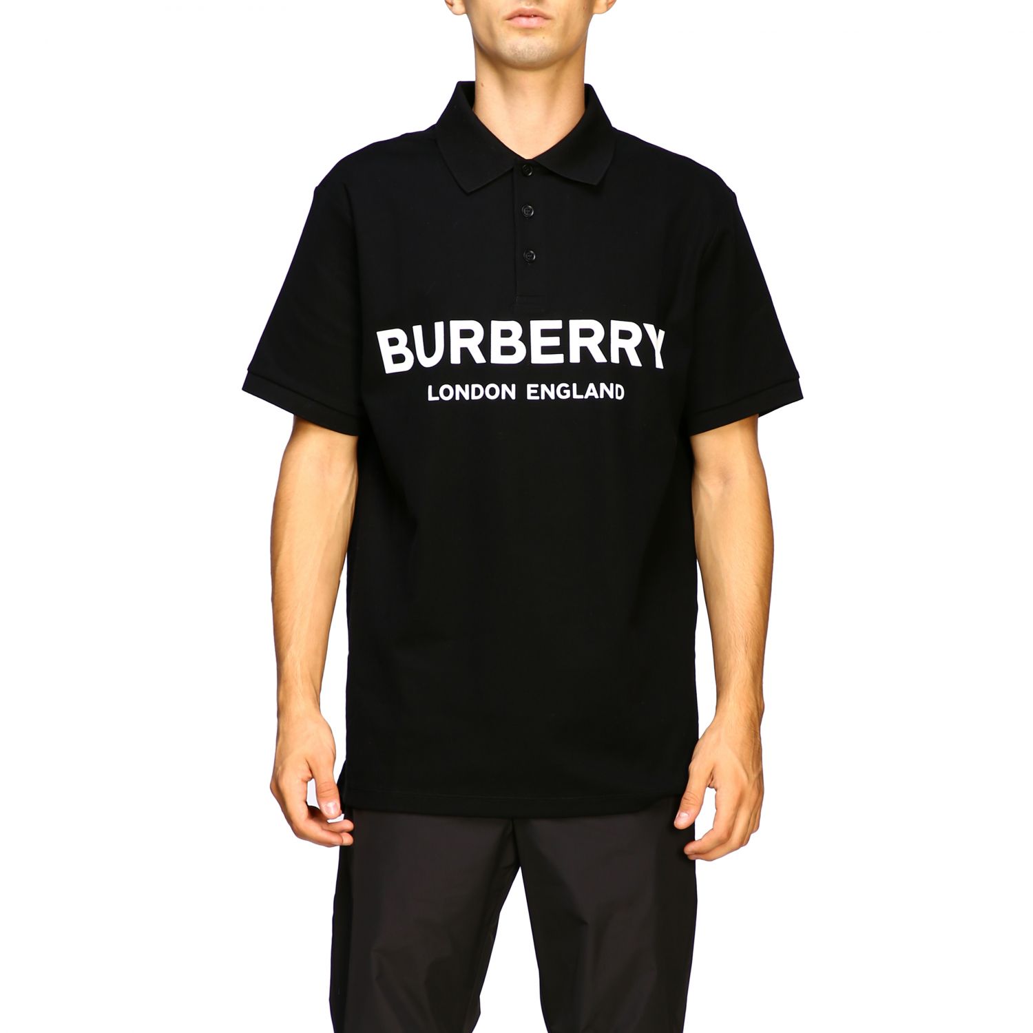 Shop Polo Negro Burberry con Logo de Letras y Mangas Cortas. 80094971