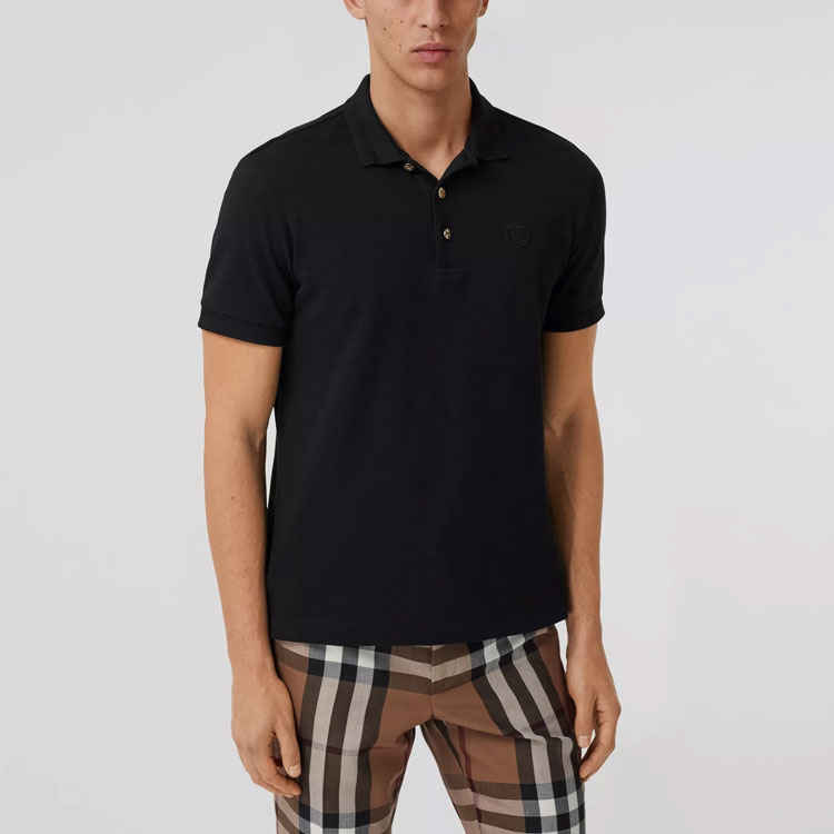 Shop Polo de Manga Corta Negro Sólido con Botones para Hombre de Burberry. 80374351