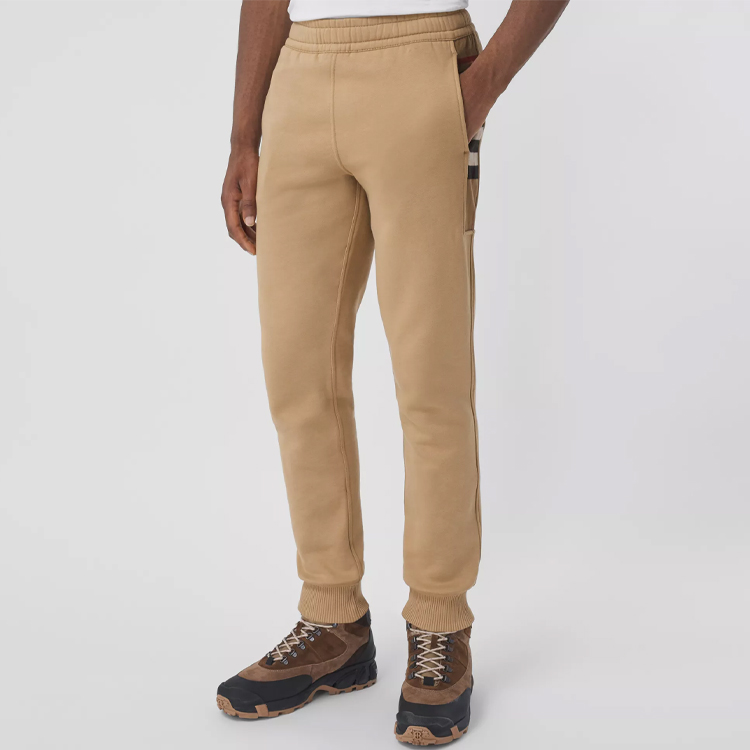 Purchase Pantalones jogger Burberry de punto con patrón de cuadros laterales en camel. 80450141