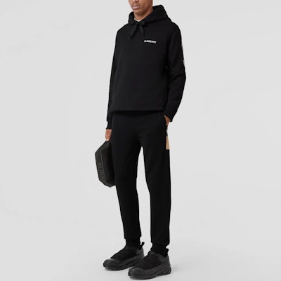 Burberry SS22 Pantalones Negros Jogger con Diseño Lateral de Cuadros en Algodón. 80590661 Shop Burberry SS22 Pantalones Negros Jogger con Diseño Lateral de Cuadros en Algodón. 80590661