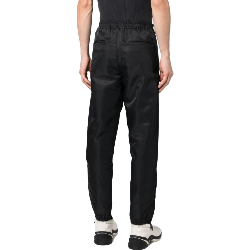 Purchase Burberry Pantalones Casuales Negros SS23 con Diseño de Botón y Color Sólido. 80686821
