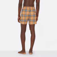 Shop Shorts de Natación Burberry SS23 con Estampado a Cuadros en Naranja Oscuro. 80707671