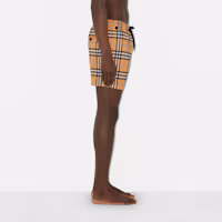 Purchase Shorts de Natación Burberry SS23 con Estampado a Cuadros en Naranja Oscuro. 80707671
